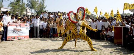 Traditional tiger dancers performing during the march  Joydip Suchandra Kundu/Sanctuary